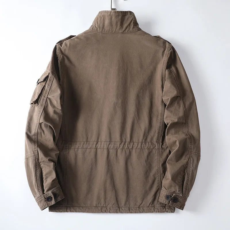 Men's loose-fit retro cotton jacket in light brown, shown with zip front closed.
