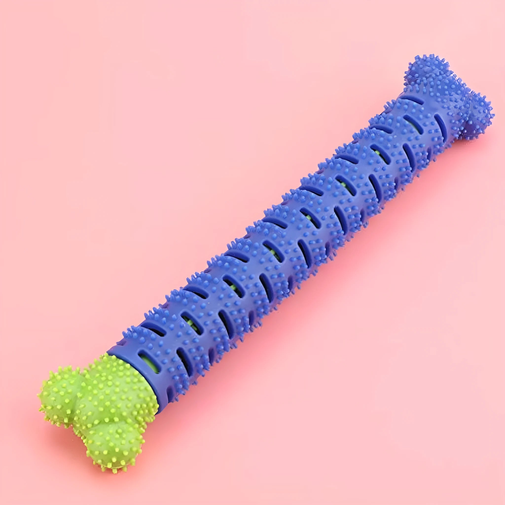 Blue silicone dog teeth cleaning stick with serrated brush head and gum massage nodules