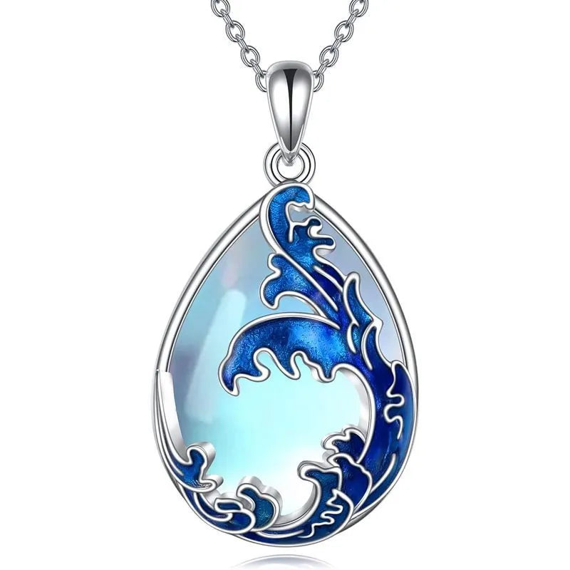 Moonstone blue alloy heart pendant necklace with chain on white background