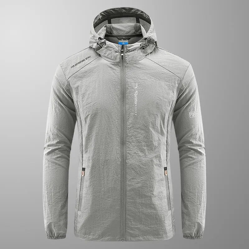 Lightweight men's hooded nylon summer jacket in loose fit on a hanger.