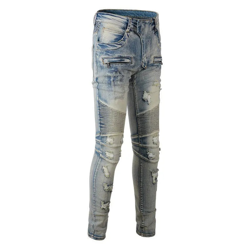 Light blue distressed men's slim fit jeans with hand-frayed rips and a straight leg cut.