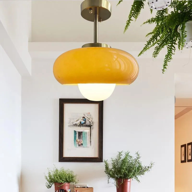 Bauhaus style three headed egg tart pendant light with glass shades in milky white finish