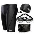 Men's black five-piece swimming set with trunks, goggles, waterproof cap, earplugs, nose clip, and carry bag.
