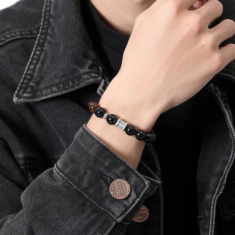 Men's black obsidian mantra bracelet with 10mm prayer wheel beads and silver connections