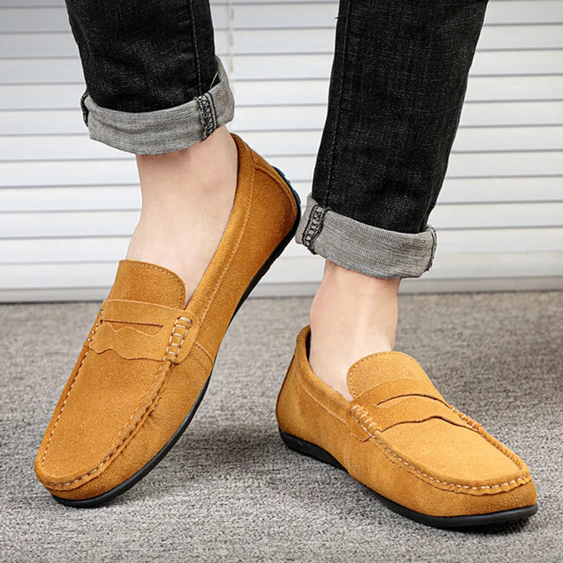 Men's solid colour suede loafers with round toe and slip-on design on rubber sole