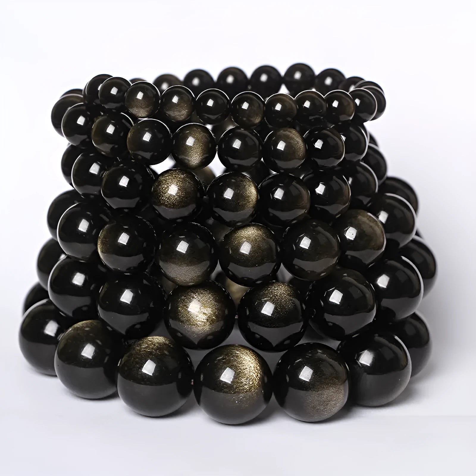 Hand-woven black obsidian bracelet showing round crystal beads in 8mm to 16mm diameter options with ethnic unisex styling