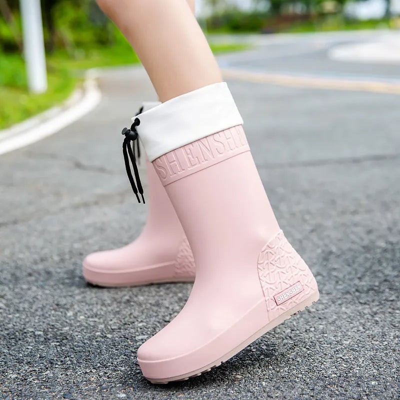 Women's non-slip PVC rain boots in apricot colour showing waterproof wellington boot design