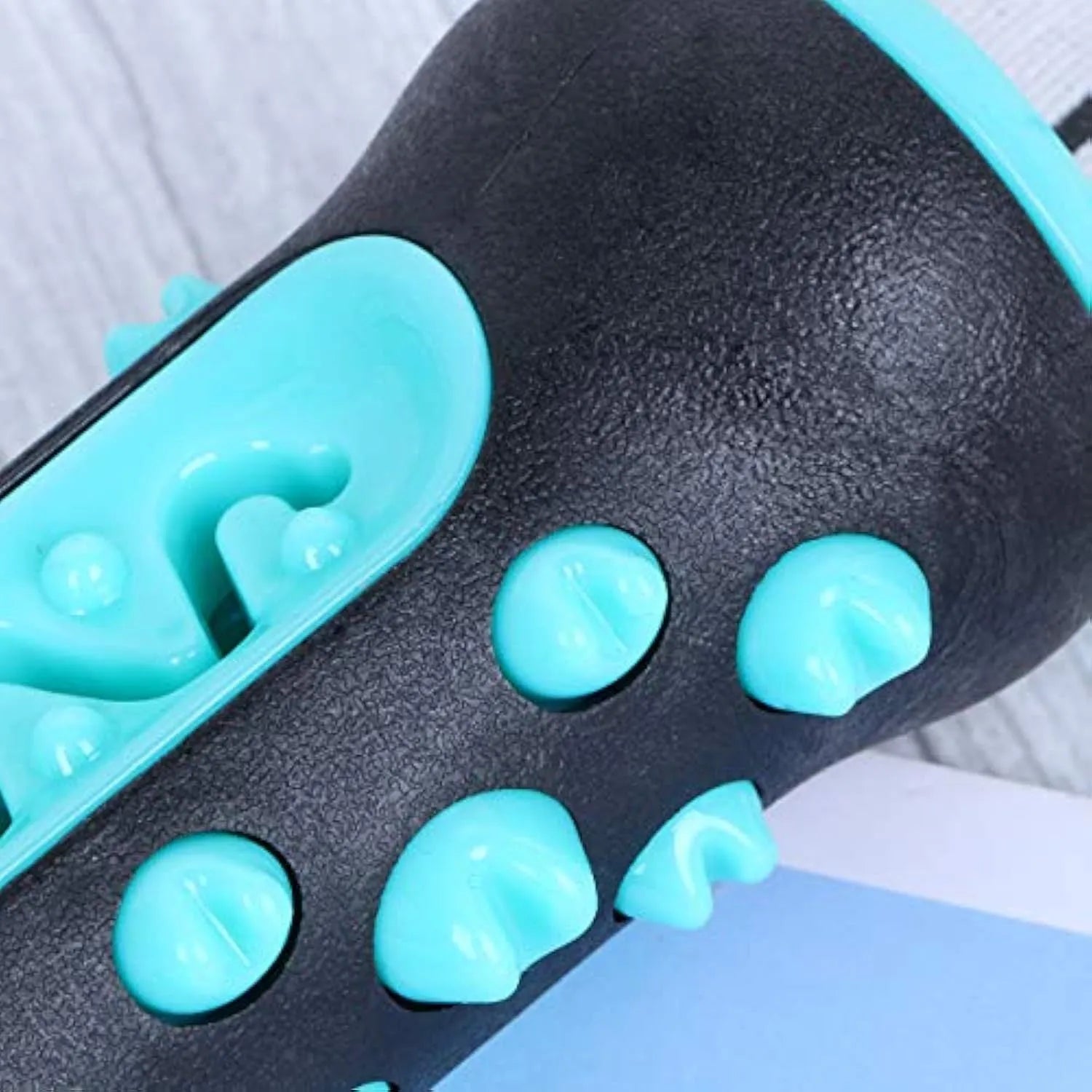 A blue natural rubber dog dental chew toy shaped as a textured stick, measuring 15cm long.