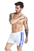 Men's blue lace-up sports shorts with slim fit and polyester stretch fabric