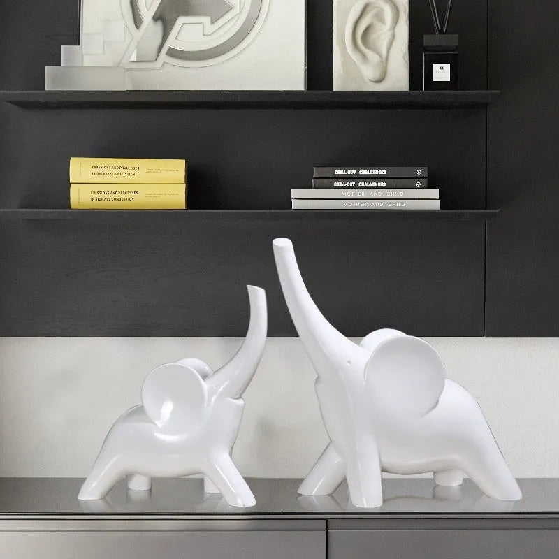 Large rose gold resin elephant ornament with modern simplicity style on a shelf