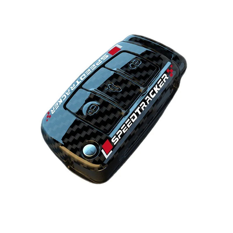 Carbon fibre style car key cover with a small mirror, shown in black and white colour options.