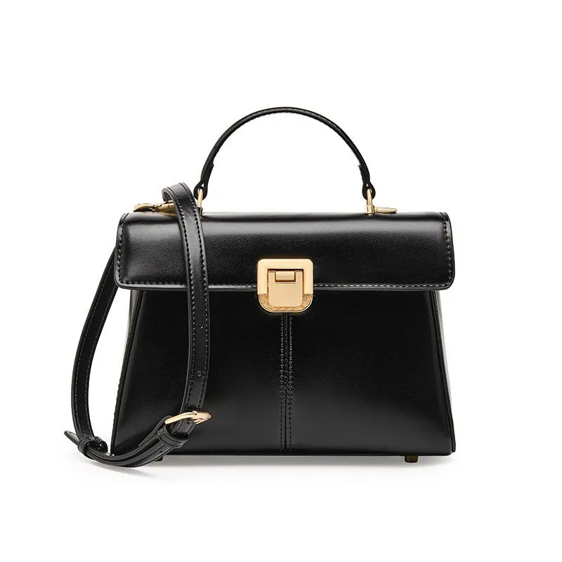 Women's black genuine leather shoulder bag with horizontal square shape and cover opening