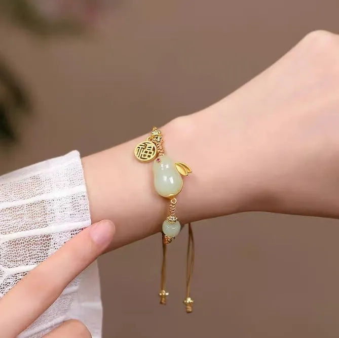 Hetian jade rabbit charm bracelet with yellow string for women