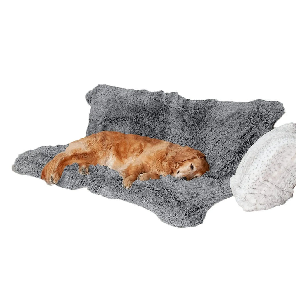 Plush waterproof dog cushion in dark grey, showing double-layer thickness on a wooden floor.