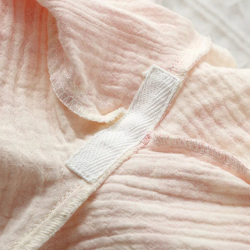 Women's pink cotton gauze suit set with lace-up trousers and long sleeve top for home and casual wear