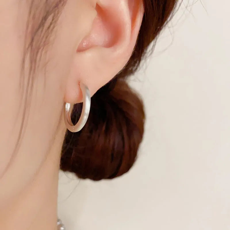Geometric simple style gold or silver colour clip-on earrings for women with round eyelet design.
