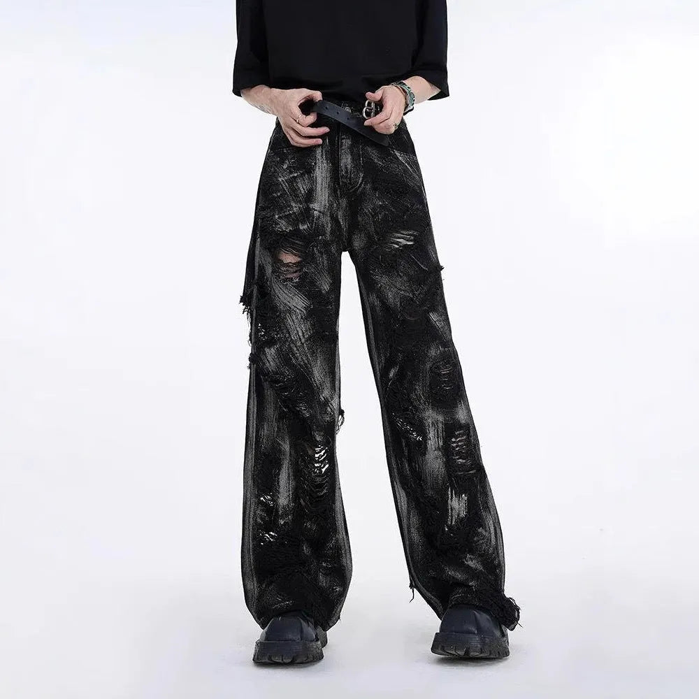 Men's heavy wash graffiti denim jeans in American high street style showing mid-waist fit and zipper fly