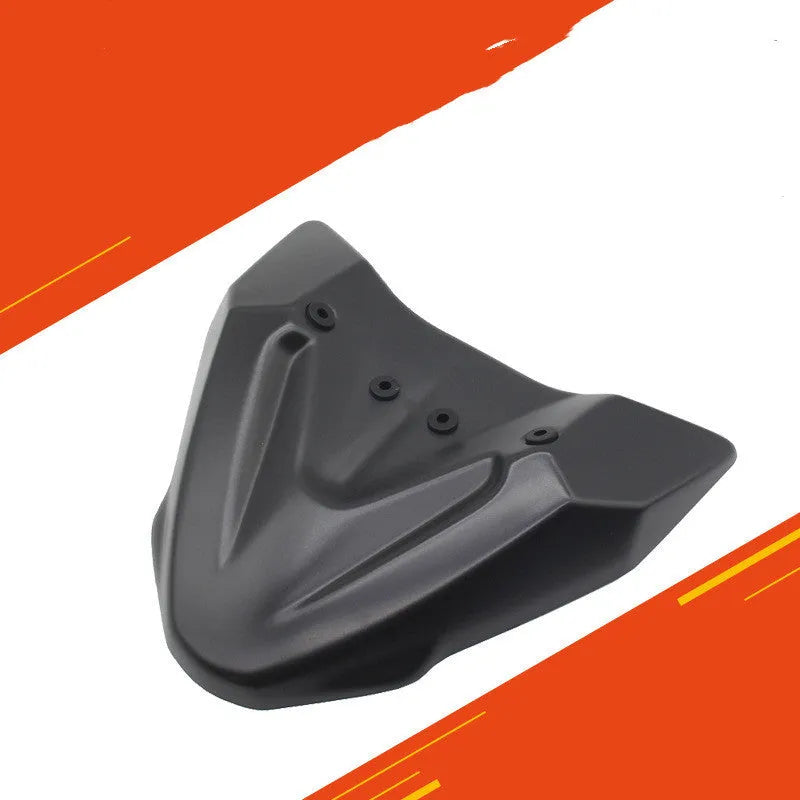 Black fixed wind front wing accessory for KTM Adventure motorcycles on packaging measuring 34.5x25x7.5 cm