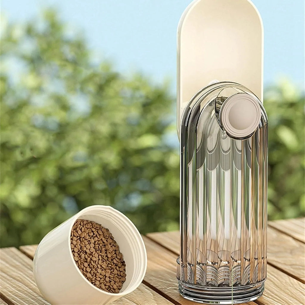 Green foldable dog water bottle with leak-proof lid and food container, shown extended for use.