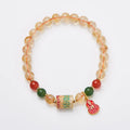 Hand-woven citrine five sutra bracelet with 6mm crystal stones in geometric Buddhist design