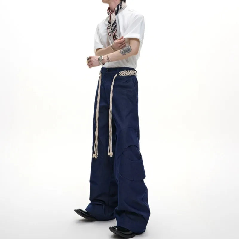 Men's dark blue loose-fit straight-leg cotton jeans with zip fly and pocket decoration.