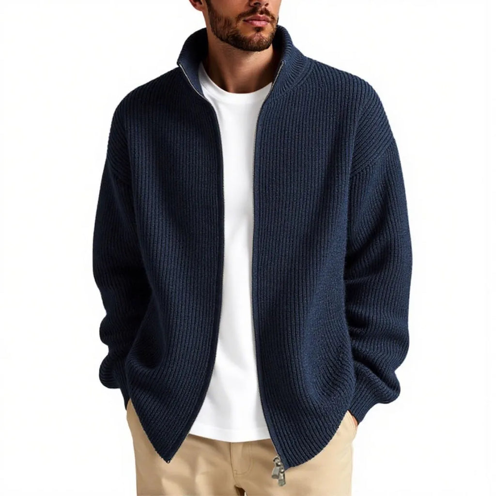 Men's loose fit cardigan sweater in grey, showing front button detail.
