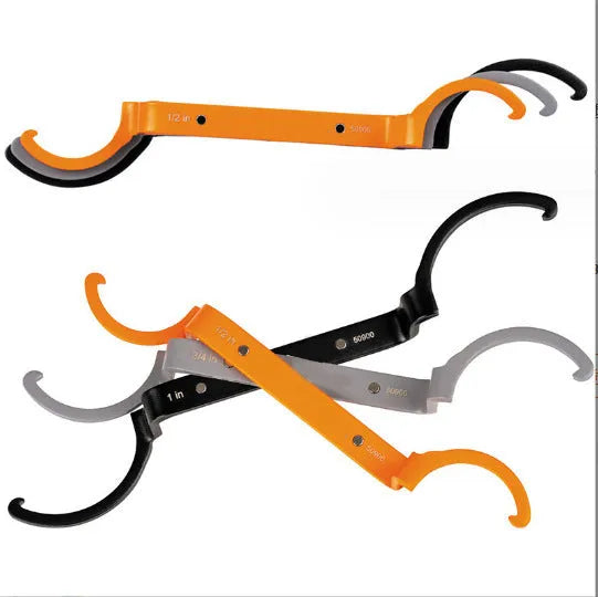Orange, grey, and black magnetic suction wrench set with catheter lock, shown with size comparison.