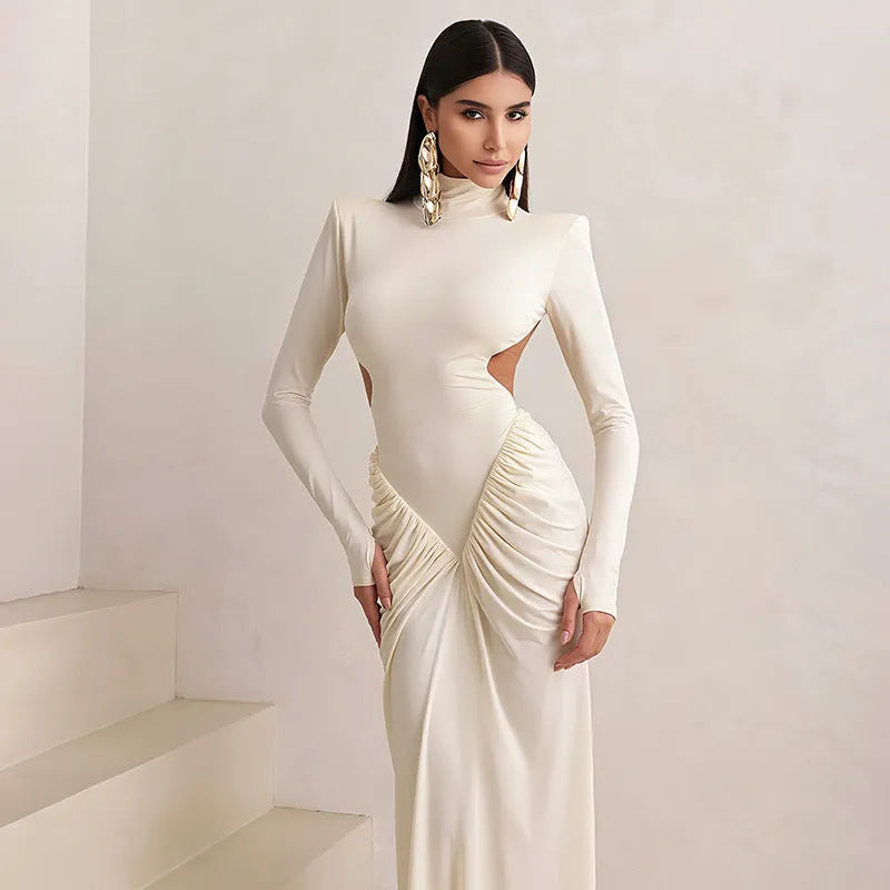 Women's backless pleated dress with high collar and long sleeves in slim fit silhouette