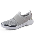 Women's low-top casual sneakers in blue, featuring a breathable mesh interior and a colour-matching pattern.