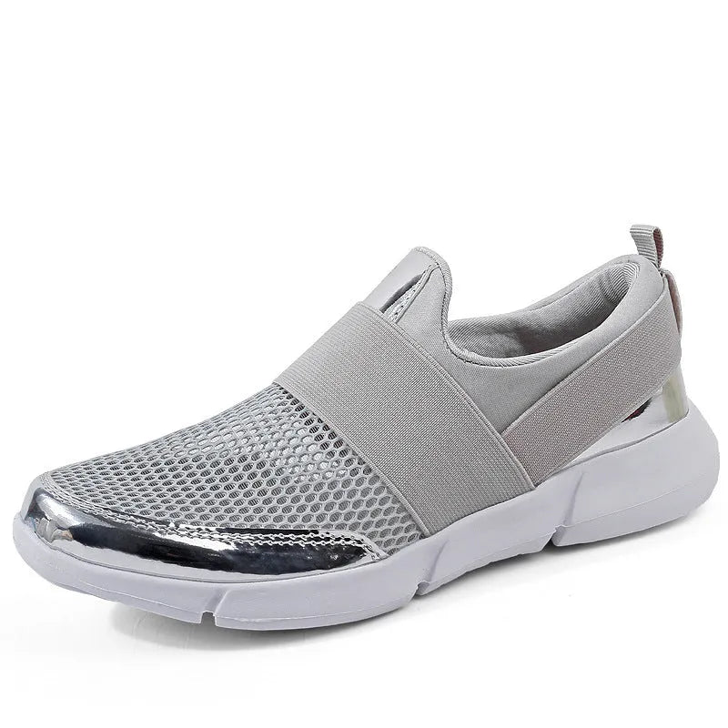 Women's low-top casual sneakers in blue, featuring a breathable mesh interior and a colour-matching pattern.