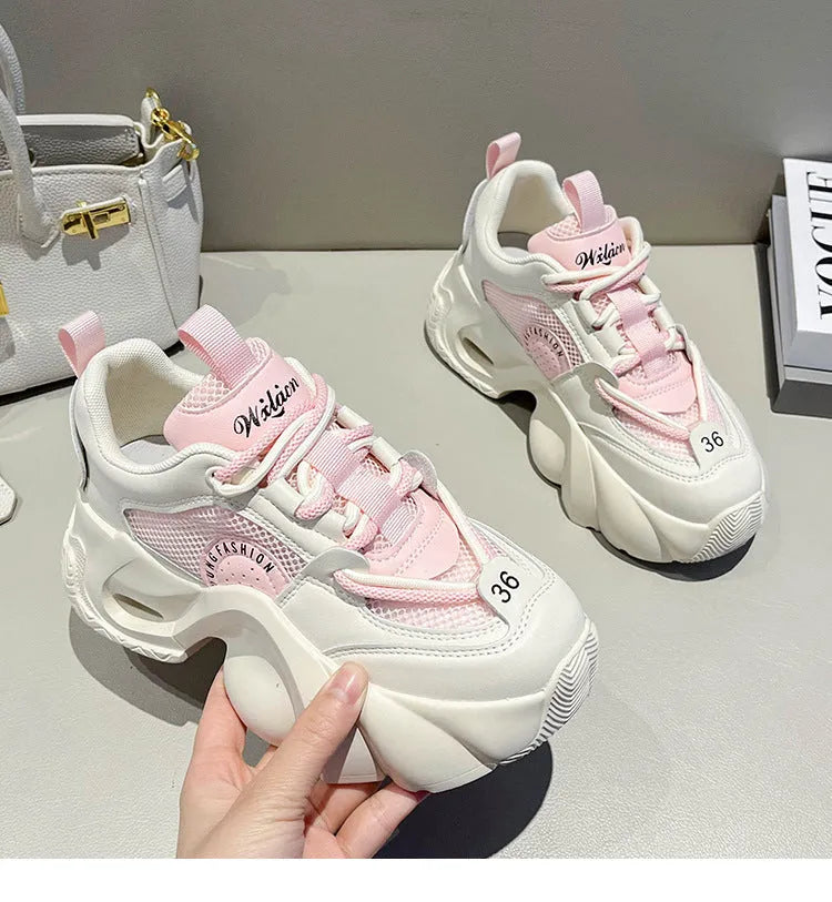 Women's beige sneakers with a cross strap and thick sole