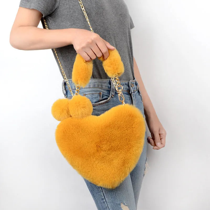 Heart-shaped women's plush handbag with shoulder strap in multiple colour options