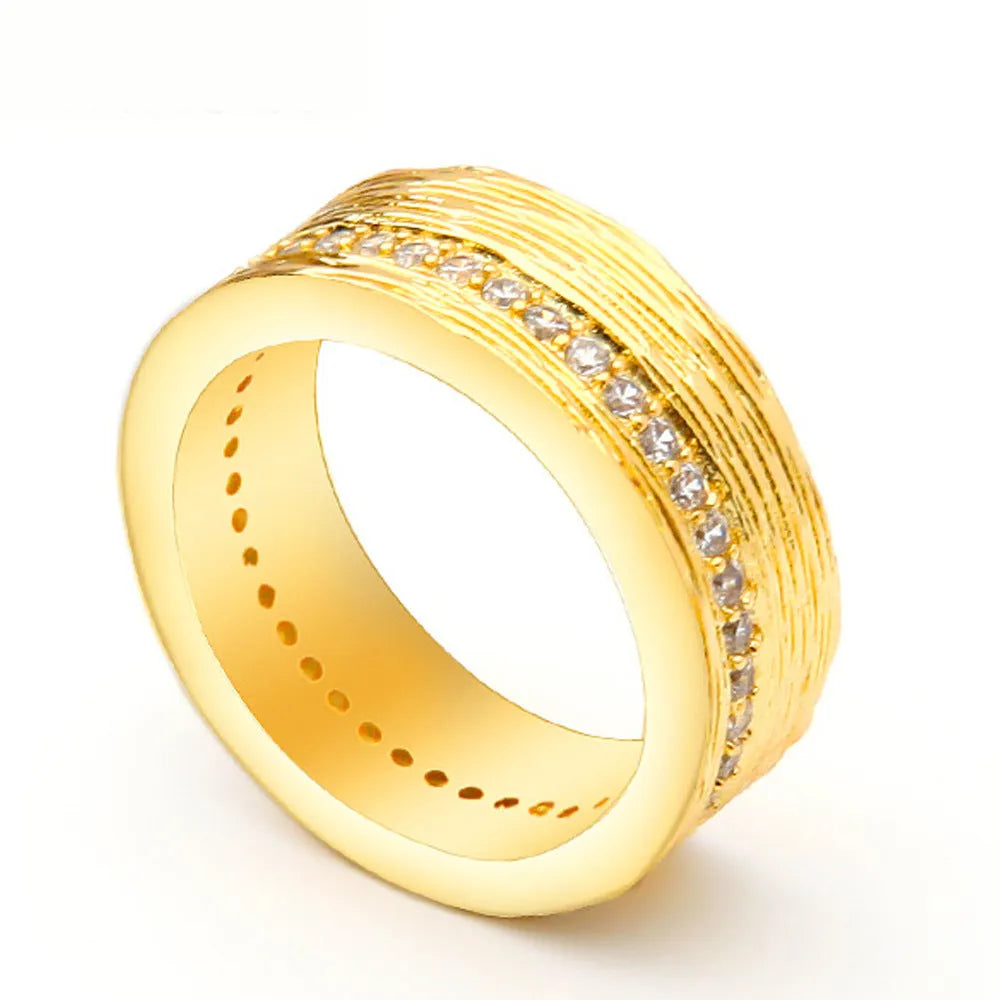 Gold geometric women's ring with zircon accents on a copper base, shown in UK sizes 6, 7, and 8.