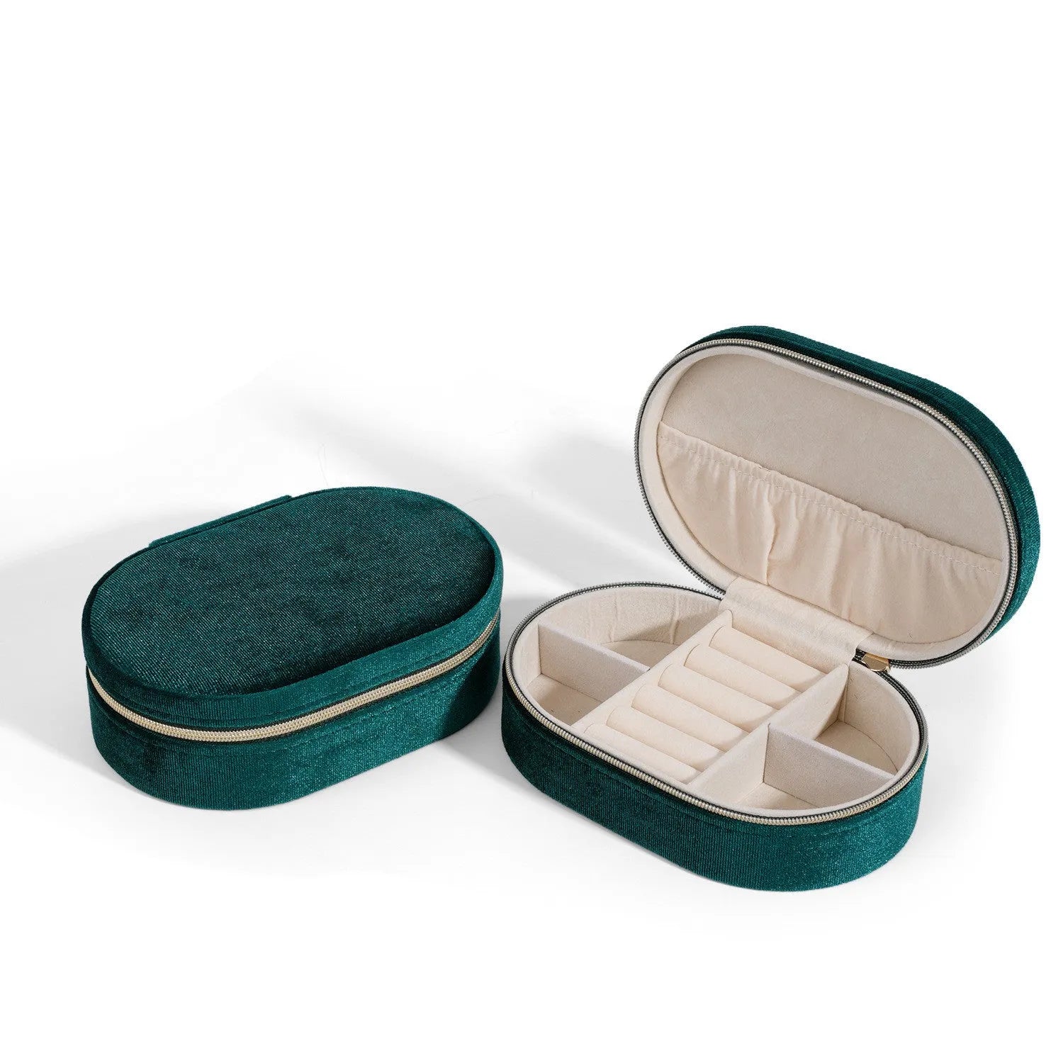 Oval velvet jewellery box in lake blue colour with flannel interior, shown with dimensions 15cm by 10cm.