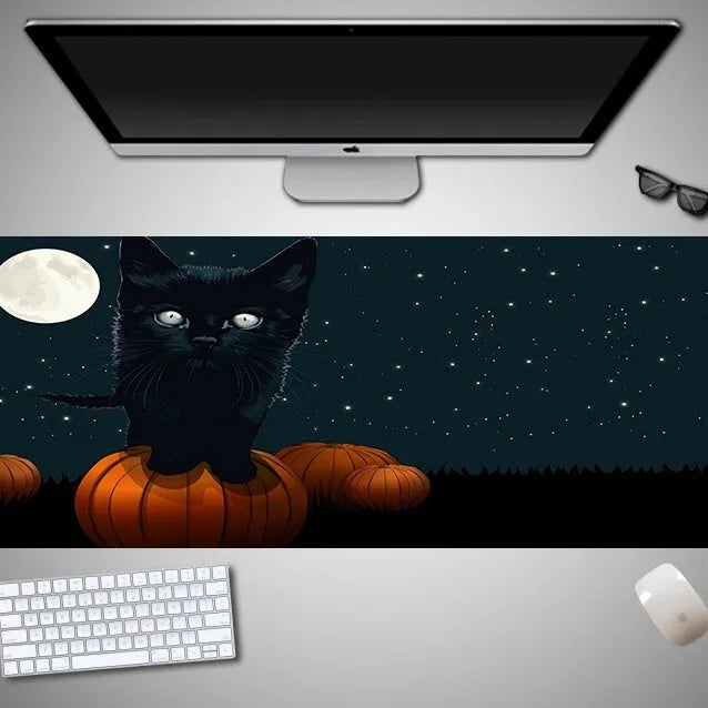 Halloween-themed oversized mouse pad showing rubber cloth texture and non-slip base
