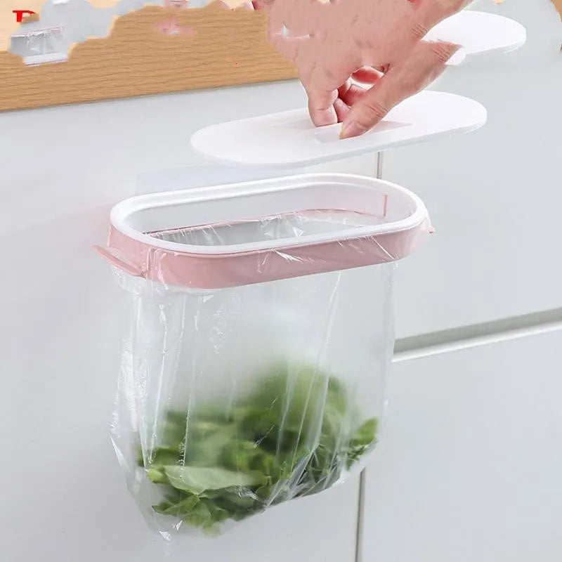 Blue plastic kitchen garbage bag storage rack mounted on cupboard door holding roll-on bin liners