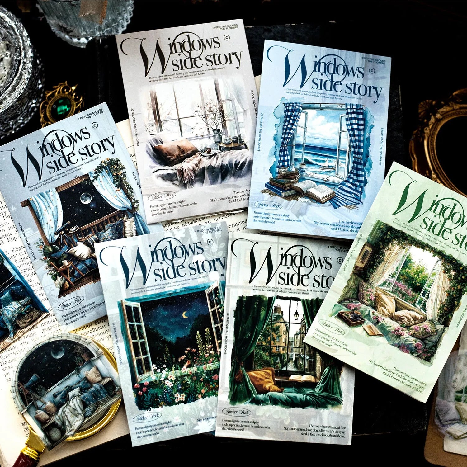 Set of six retro window scene decorative stickers for journals, showing garden, seaside, and street corner designs.
