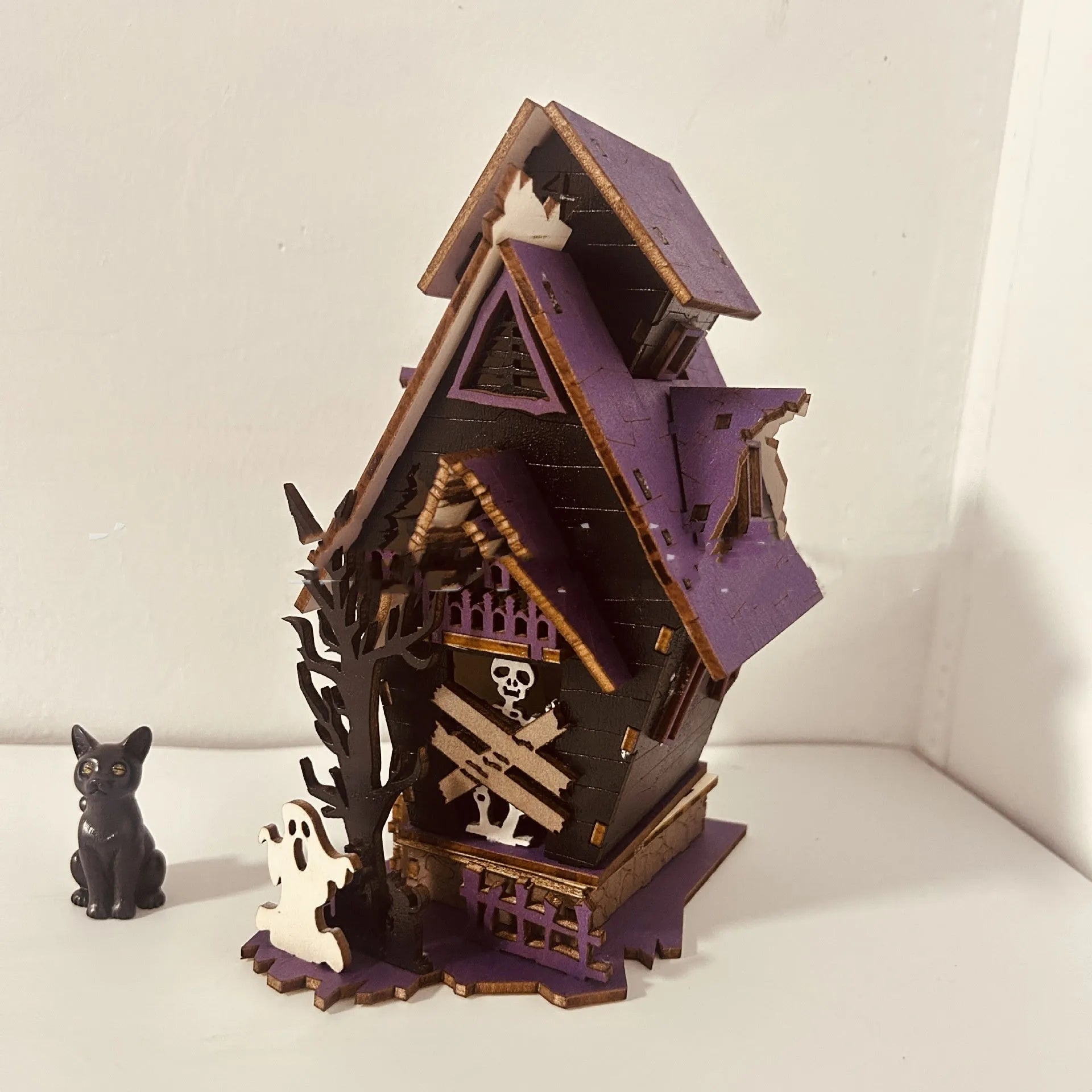 Unlit wooden DIY haunted house decoration measuring 14x10.5x19cm for Halloween table display
