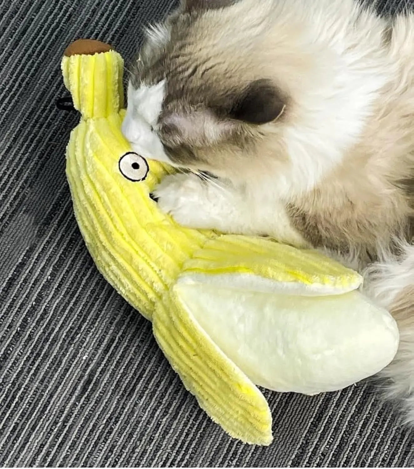Yellow banana-shaped cat toy with soft plush fabric and crinkle paper inside