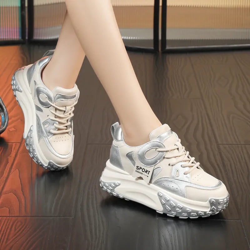 Men's leather casual shoes with thick rubber sole and wedge heel in lace-up design.