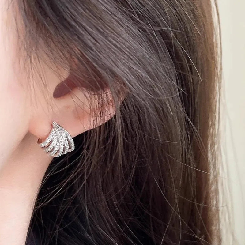 Platinum-coloured geometric zircon earrings with clean line design and electroplated finish