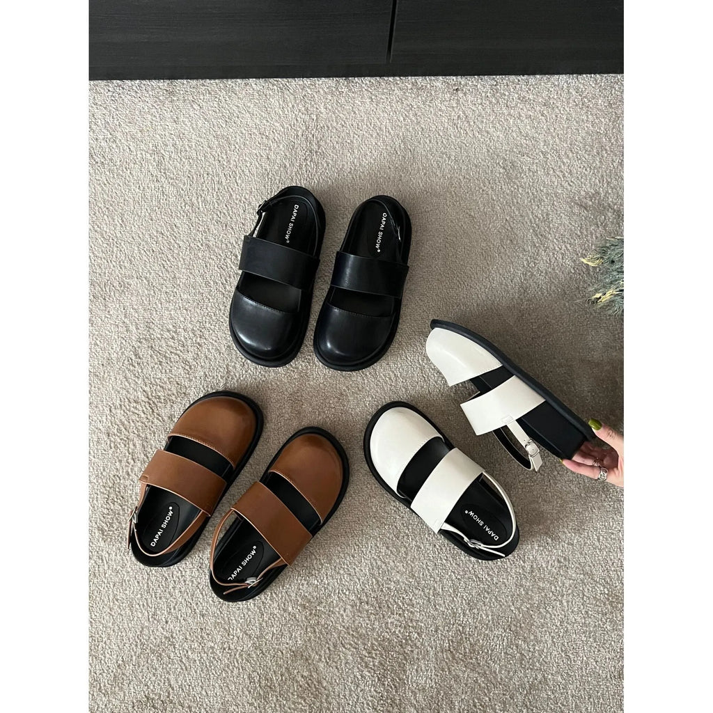 Korean style closed toe sandals with an ankle strap buckle in black, brown, and apricot colours.