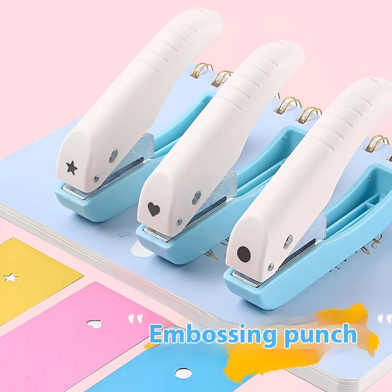 Small manual embossing punching machine with love, star, and round pattern discs for paper crafts.