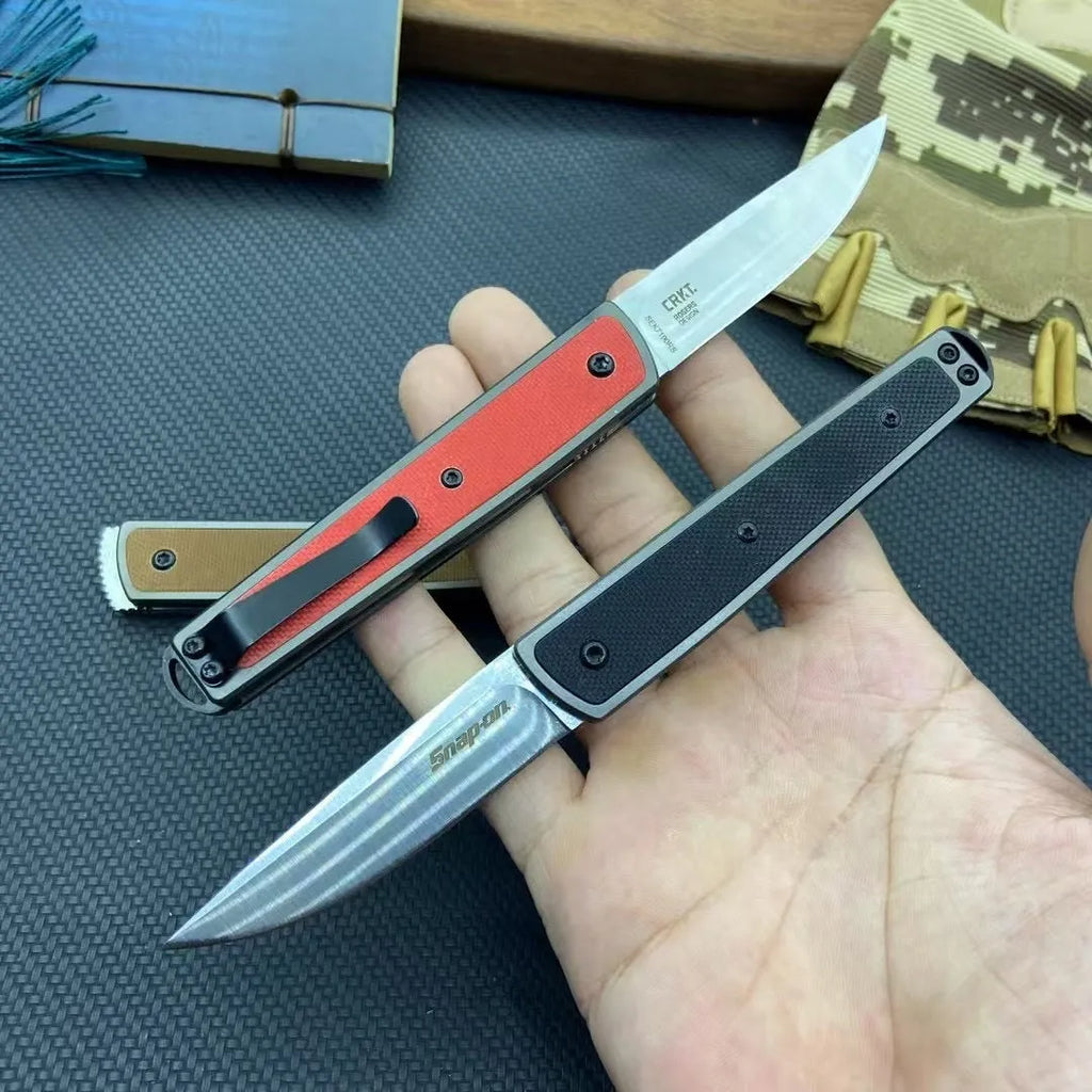 Folding fruit knife with stainless steel blade in black, coffee or red colour options showing extended and folded positions