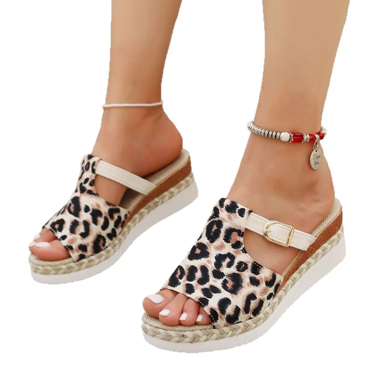 Leopard print wedge platform sandal with a fish mouth open toe on a rubber sole.