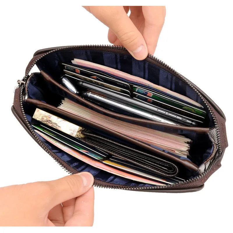 Men's business casual clutch made of soft PU leather, black, with visible sewing line detail and anti-theft design
