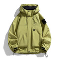 Men's black waterproof hooded jacket with long sleeves on a hanger.