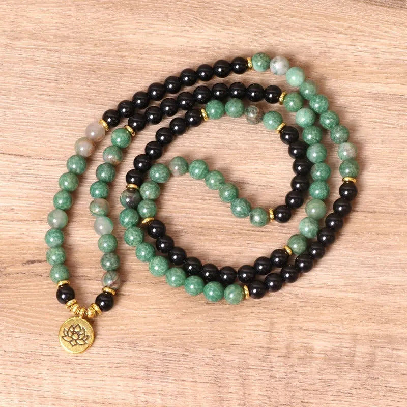 Green and black elastic beaded bracelet with alloy construction and natural style