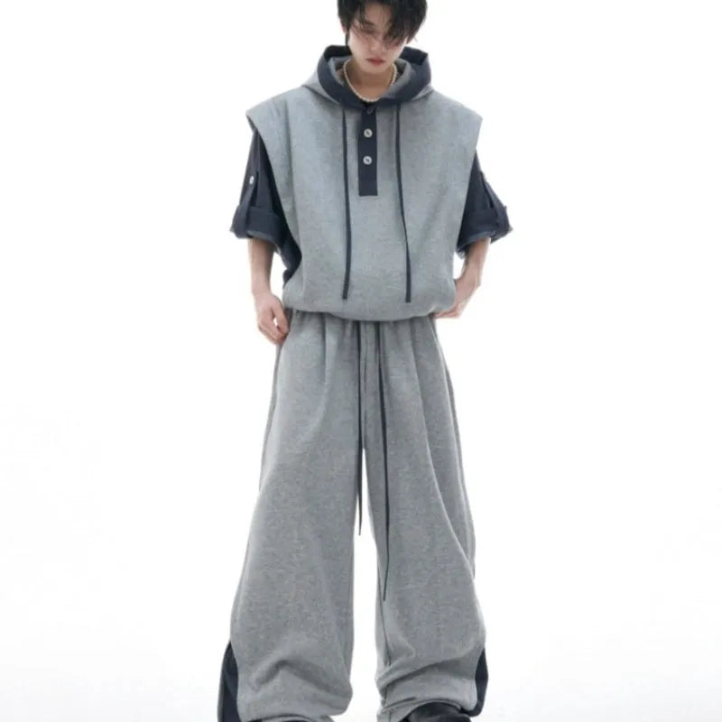 Men's polyester hooded tracksuit set with three-dimensional stitching in black or gray coordinated colours