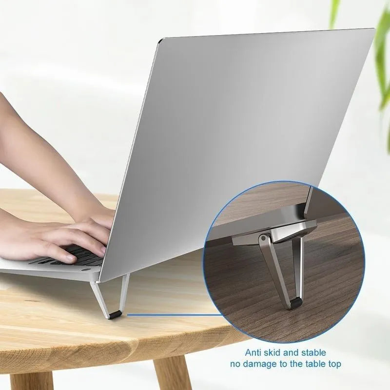 Silver aluminium alloy foldable computer bracket with 3M adhesive backing for under-desk mounting